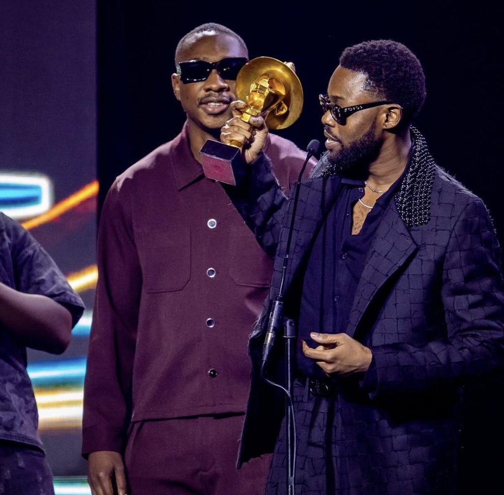 Lojay receives his awards at The Headies Awards 2025