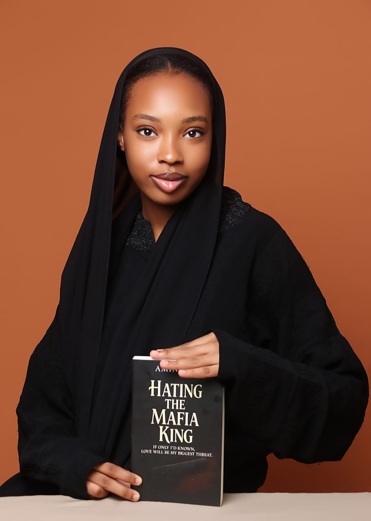 Amina SB with the cover of Hating The Mafia King